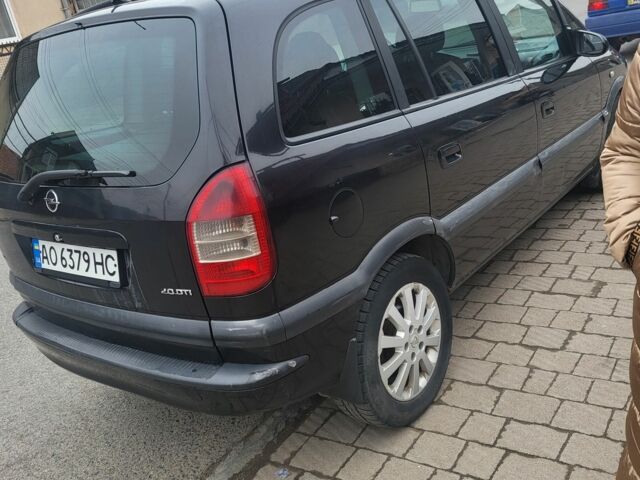 Черный Опель Зафира, объемом двигателя 2 л и пробегом 450 тыс. км за 3700 $, фото 1 на Automoto.ua