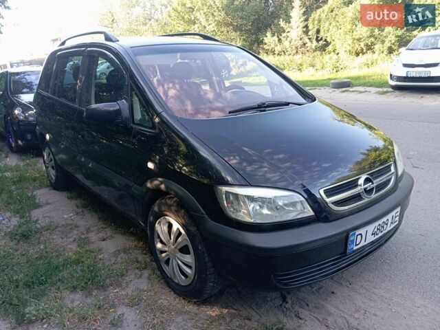 Черный Опель Зафира, объемом двигателя 2 л и пробегом 320 тыс. км за 3900 $, фото 1 на Automoto.ua