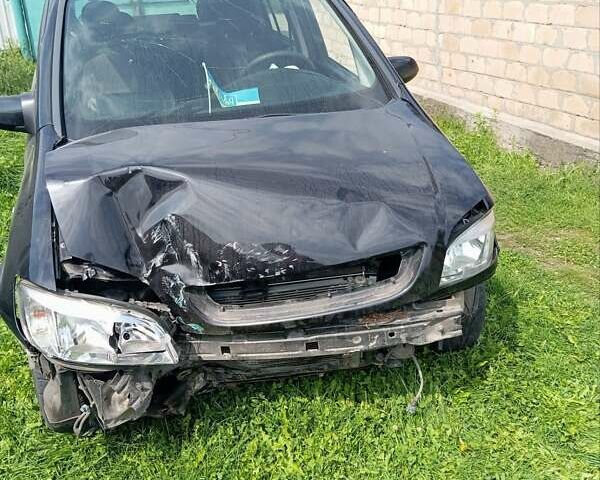 Чорний Опель Зафіра, об'ємом двигуна 1.8 л та пробігом 380 тис. км за 1800 $, фото 1 на Automoto.ua