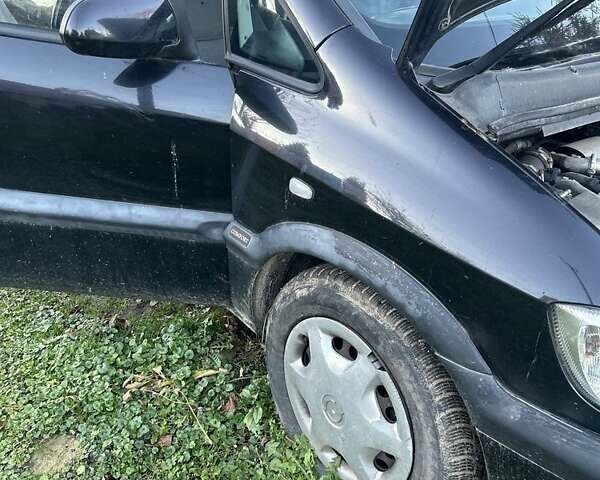 Черный Опель Зафира, объемом двигателя 2 л и пробегом 316 тыс. км за 3500 $, фото 1 на Automoto.ua
