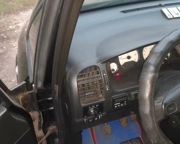 Черный Опель Зафира, объемом двигателя 2 л и пробегом 300 тыс. км за 4100 $, фото 1 на Automoto.ua