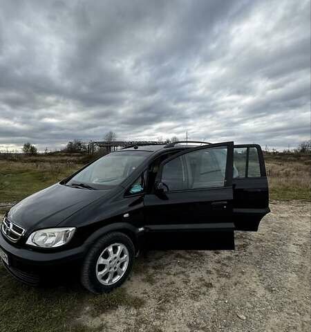 Черный Опель Зафира, объемом двигателя 2 л и пробегом 370 тыс. км за 3800 $, фото 1 на Automoto.ua