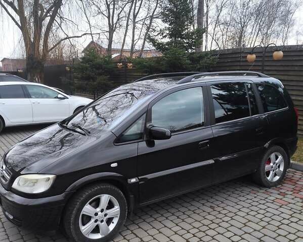 Черный Опель Зафира, объемом двигателя 1.6 л и пробегом 289 тыс. км за 4500 $, фото 1 на Automoto.ua