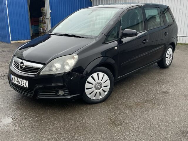Черный Опель Зафира, объемом двигателя 1.9 л и пробегом 350 тыс. км за 2400 $, фото 1 на Automoto.ua
