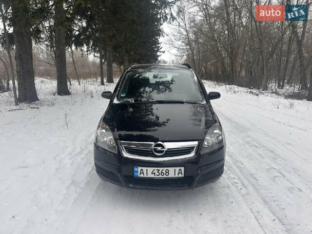 Черный Опель Зафира, объемом двигателя 1.6 л и пробегом 294 тыс. км за 4100 $, фото 1 на Automoto.ua