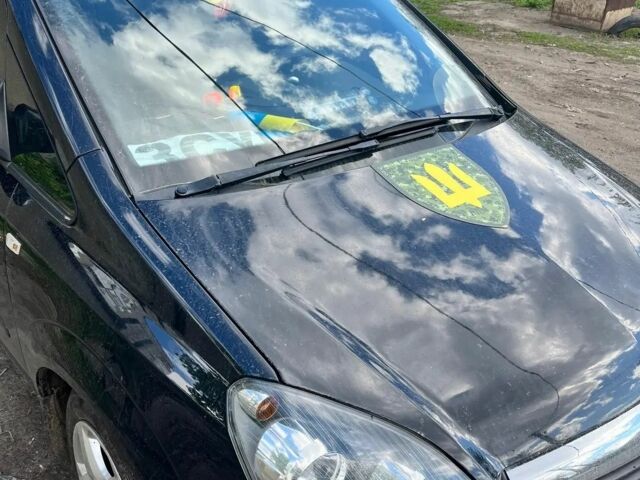 Черный Опель Зафира, объемом двигателя 8 л и пробегом 400 тыс. км за 5000 $, фото 1 на Automoto.ua