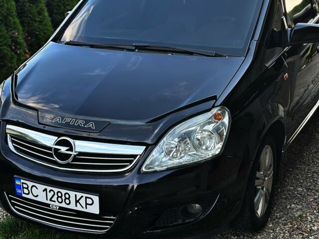 Черный Опель Зафира, объемом двигателя 1.9 л и пробегом 218 тыс. км за 5700 $, фото 1 на Automoto.ua