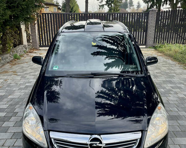 Черный Опель Зафира, объемом двигателя 1.6 л и пробегом 206 тыс. км за 6700 $, фото 1 на Automoto.ua