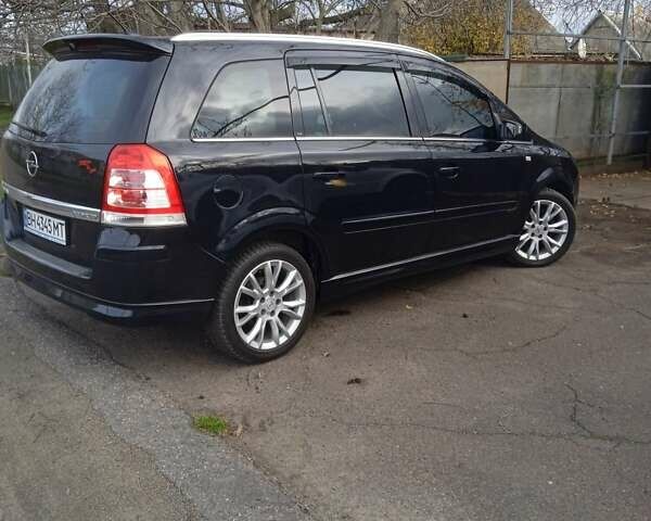 Черный Опель Зафира, объемом двигателя 1.6 л и пробегом 211 тыс. км за 8000 $, фото 1 на Automoto.ua