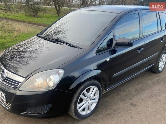 Черный Опель Зафира, объемом двигателя 1.6 л и пробегом 265 тыс. км за 5400 $, фото 1 на Automoto.ua