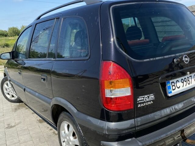Черный Опель Зафира, объемом двигателя 2 л и пробегом 250 тыс. км за 4150 $, фото 1 на Automoto.ua