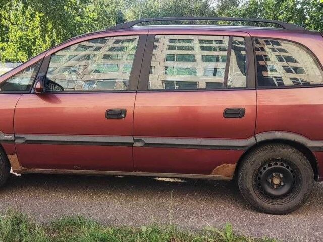 Красный Опель Зафира, объемом двигателя 1.6 л и пробегом 290 тыс. км за 3600 $, фото 1 на Automoto.ua