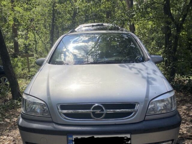 Серый Опель Зафира, объемом двигателя 2 л и пробегом 300 тыс. км за 1600 $, фото 1 на Automoto.ua