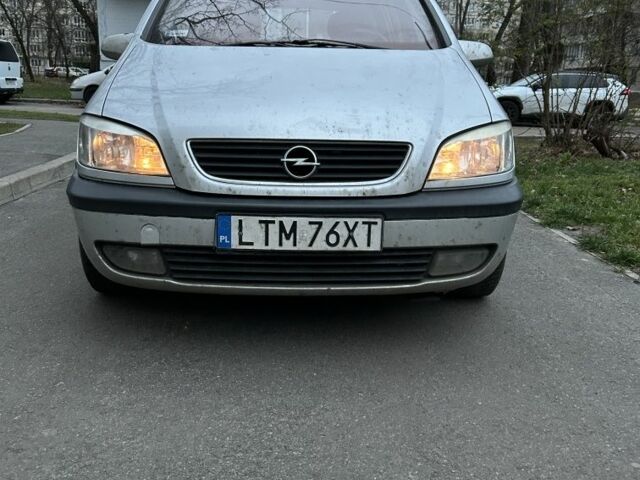 Серый Опель Зафира, объемом двигателя 1.8 л и пробегом 433 тыс. км за 2300 $, фото 1 на Automoto.ua
