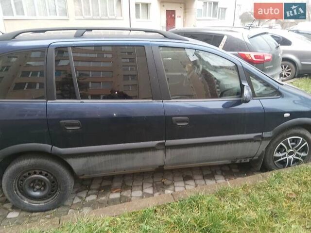 Синий Опель Зафира, объемом двигателя 2 л и пробегом 250 тыс. км за 2500 $, фото 1 на Automoto.ua