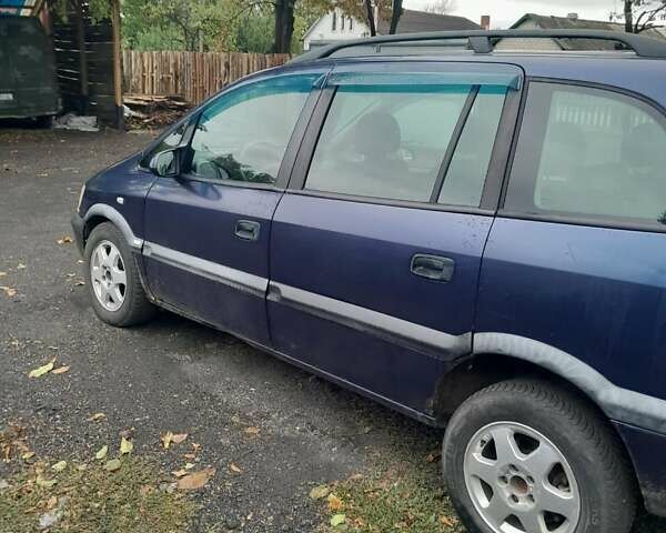 Синий Опель Зафира, объемом двигателя 1.99 л и пробегом 321 тыс. км за 3450 $, фото 1 на Automoto.ua