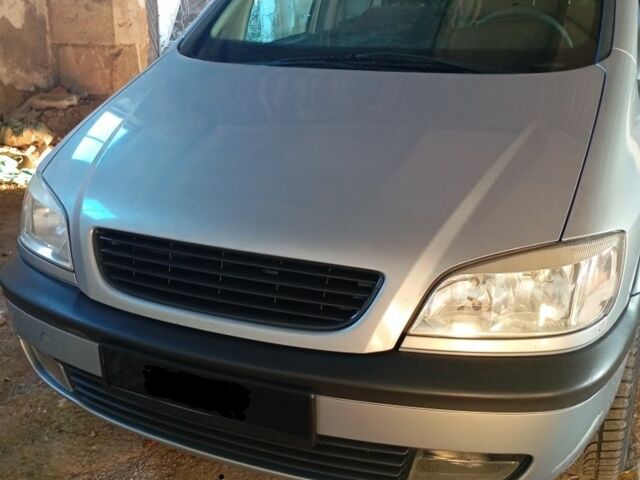 Синий Опель Зафира, объемом двигателя 1.8 л и пробегом 300 тыс. км за 2800 $, фото 1 на Automoto.ua