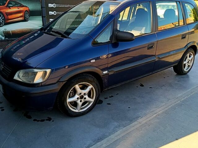 Синий Опель Зафира, объемом двигателя 2 л и пробегом 390 тыс. км за 3000 $, фото 1 на Automoto.ua