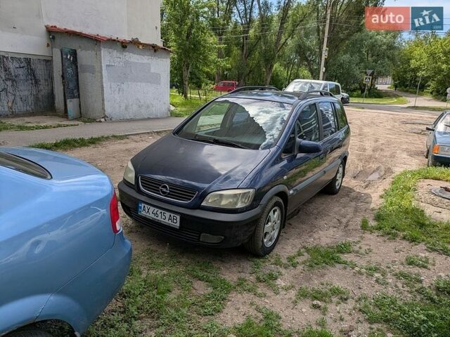 Синий Опель Зафира, объемом двигателя 1.8 л и пробегом 380 тыс. км за 2300 $, фото 1 на Automoto.ua