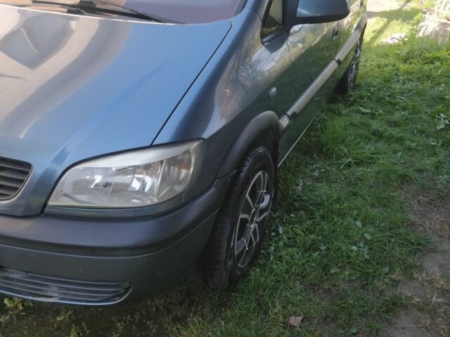 Синий Опель Зафира, объемом двигателя 2 л и пробегом 270 тыс. км за 3500 $, фото 1 на Automoto.ua