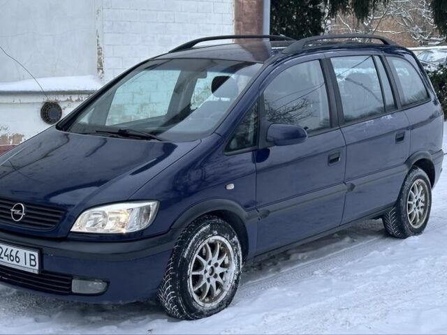 Синий Опель Зафира, объемом двигателя 2 л и пробегом 320 тыс. км за 2750 $, фото 1 на Automoto.ua