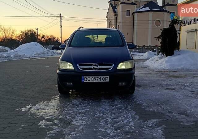 Синий Опель Зафира, объемом двигателя 2 л и пробегом 297 тыс. км за 2900 $, фото 1 на Automoto.ua