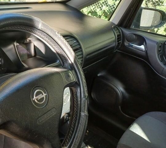 Синий Опель Зафира, объемом двигателя 2 л и пробегом 350 тыс. км за 4686 $, фото 1 на Automoto.ua