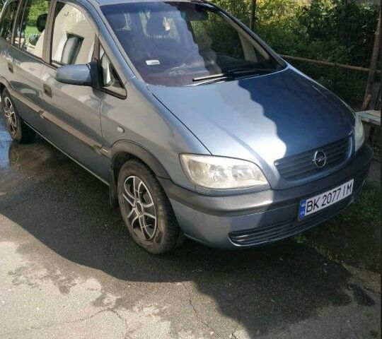 Синий Опель Зафира, объемом двигателя 2 л и пробегом 280 тыс. км за 3200 $, фото 1 на Automoto.ua