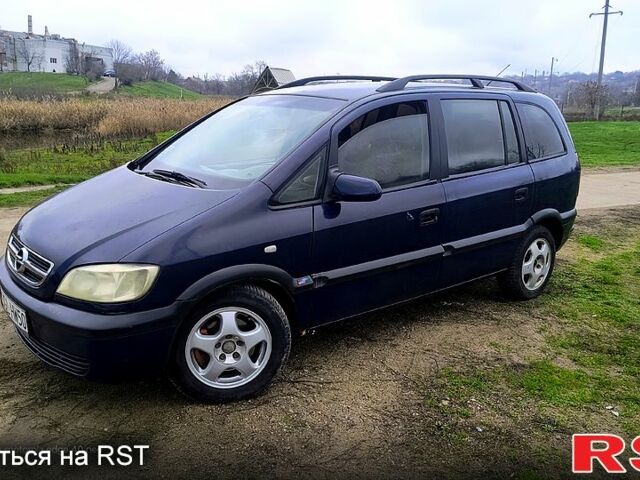 Синий Опель Зафира, объемом двигателя 2 л и пробегом 333 тыс. км за 1200 $, фото 1 на Automoto.ua