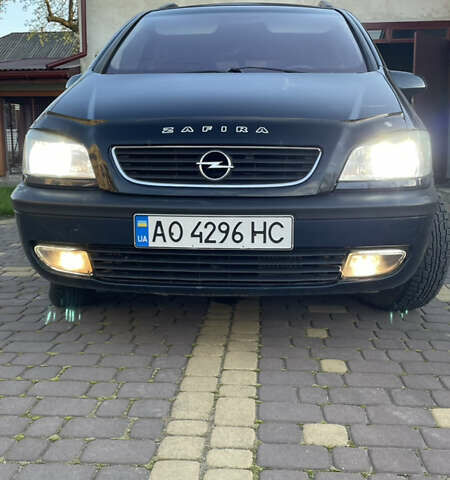 Синий Опель Зафира, объемом двигателя 2 л и пробегом 319 тыс. км за 3999 $, фото 1 на Automoto.ua