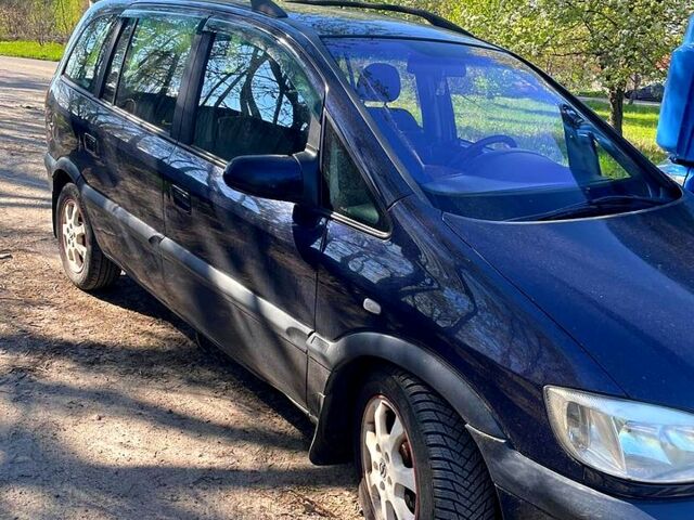 Синий Опель Зафира, объемом двигателя 2 л и пробегом 260 тыс. км за 4000 $, фото 1 на Automoto.ua