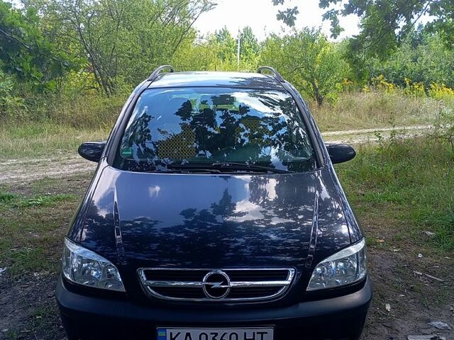 Синій Опель Зафіра, об'ємом двигуна 1.8 л та пробігом 253 тис. км за 3800 $, фото 1 на Automoto.ua