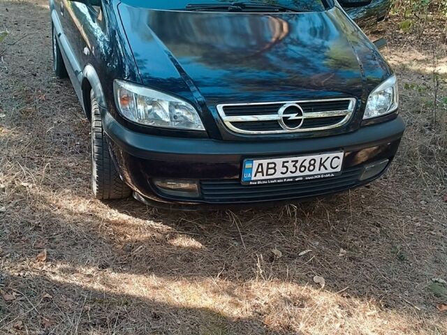 Синий Опель Зафира, объемом двигателя 1.8 л и пробегом 221 тыс. км за 4400 $, фото 1 на Automoto.ua