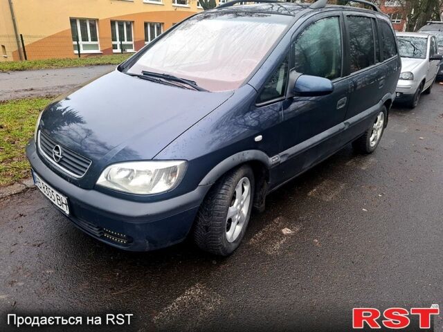 Синий Опель Зафира, объемом двигателя 2 л и пробегом 309 тыс. км за 4300 $, фото 1 на Automoto.ua