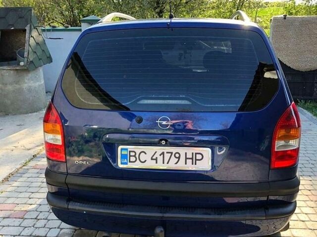 Синий Опель Зафира, объемом двигателя 2 л и пробегом 325 тыс. км за 4100 $, фото 1 на Automoto.ua
