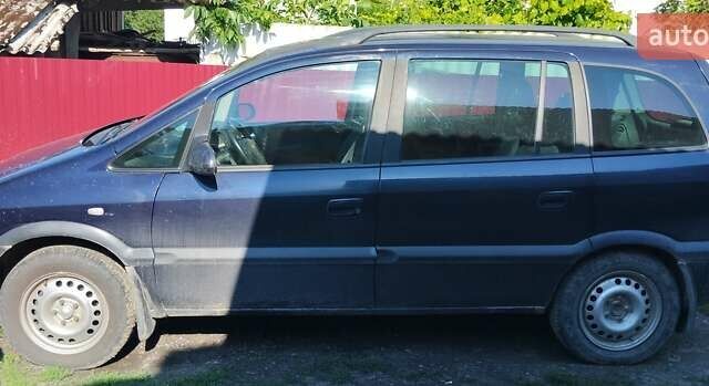 Синий Опель Зафира, объемом двигателя 2.17 л и пробегом 395 тыс. км за 4200 $, фото 1 на Automoto.ua