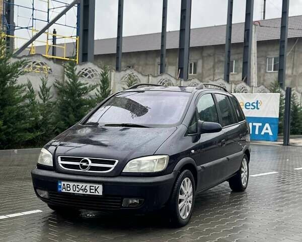 Синий Опель Зафира, объемом двигателя 2 л и пробегом 295 тыс. км за 3350 $, фото 1 на Automoto.ua