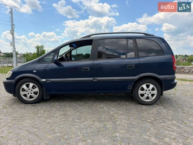 Синий Опель Зафира, объемом двигателя 2 л и пробегом 270 тыс. км за 4500 $, фото 1 на Automoto.ua