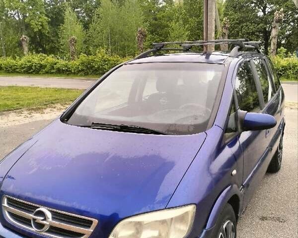Синий Опель Зафира, объемом двигателя 2 л и пробегом 280 тыс. км за 4000 $, фото 1 на Automoto.ua