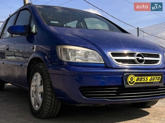Синий Опель Зафира, объемом двигателя 2 л и пробегом 328 тыс. км за 4800 $, фото 1 на Automoto.ua