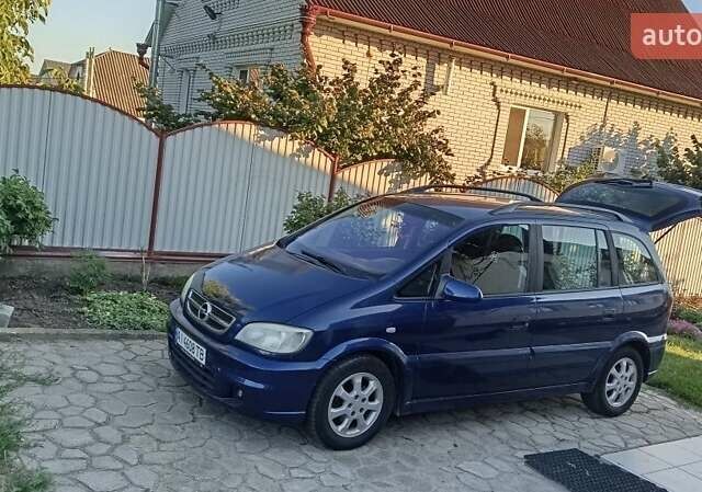 Синий Опель Зафира, объемом двигателя 1.8 л и пробегом 263 тыс. км за 4600 $, фото 1 на Automoto.ua