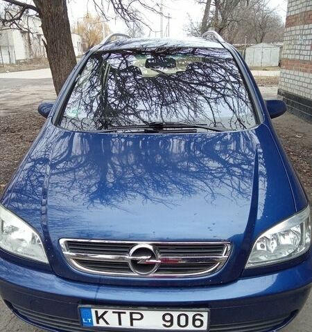 Синий Опель Зафира, объемом двигателя 2 л и пробегом 300 тыс. км за 3000 $, фото 1 на Automoto.ua