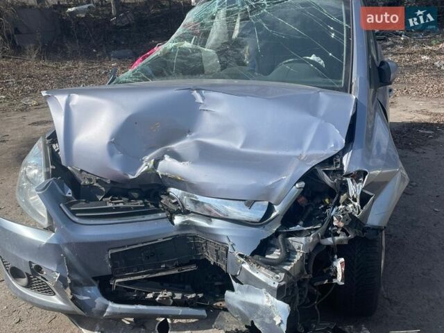 Синий Опель Зафира, объемом двигателя 1.8 л и пробегом 220 тыс. км за 1850 $, фото 1 на Automoto.ua