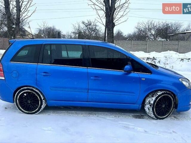 Синий Опель Зафира, объемом двигателя 2 л и пробегом 290 тыс. км за 4900 $, фото 1 на Automoto.ua