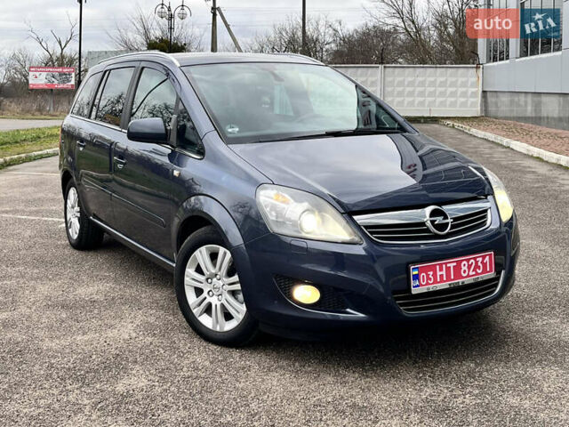 Синий Опель Зафира, объемом двигателя 1.8 л и пробегом 190 тыс. км за 7650 $, фото 1 на Automoto.ua