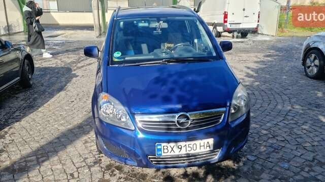 Синий Опель Зафира, объемом двигателя 1.8 л и пробегом 225 тыс. км за 6750 $, фото 1 на Automoto.ua