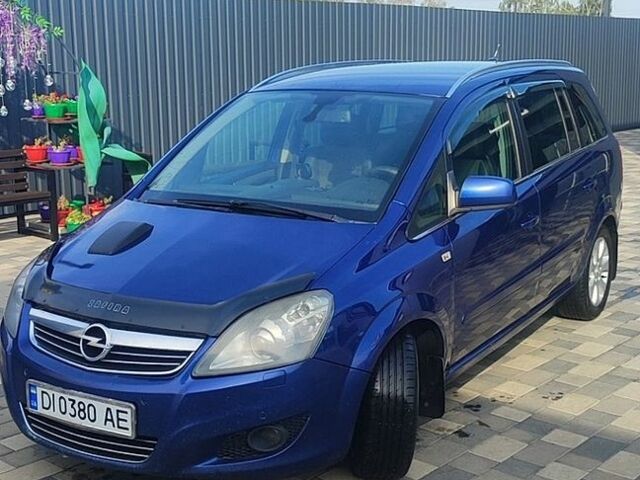 Синий Опель Зафира, объемом двигателя 1.69 л и пробегом 365 тыс. км за 7000 $, фото 1 на Automoto.ua