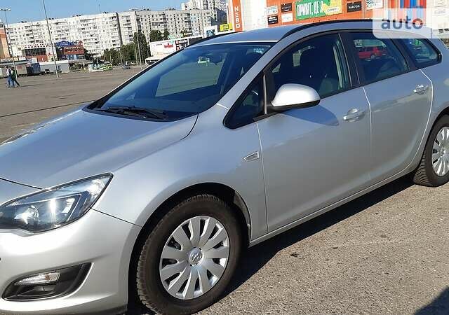 Серый Опель Astra Sports Tourer, объемом двигателя 1.6 л и пробегом 114 тыс. км за 9843 $, фото 1 на Automoto.ua