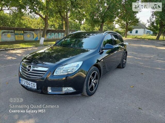 Чорний Опель Insignia Sports Tourer, об'ємом двигуна 2 л та пробігом 188 тис. км за 9058 $, фото 1 на Automoto.ua