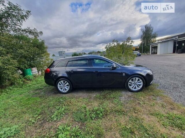 Чорний Опель Insignia Sports Tourer, об'ємом двигуна 2 л та пробігом 290 тис. км за 8800 $, фото 1 на Automoto.ua